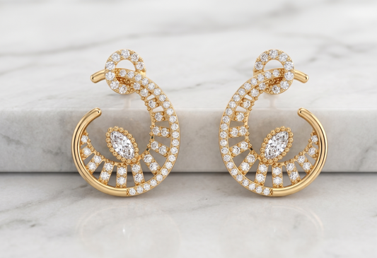 A pair of silver-toned crescent-shaped hoop earrings