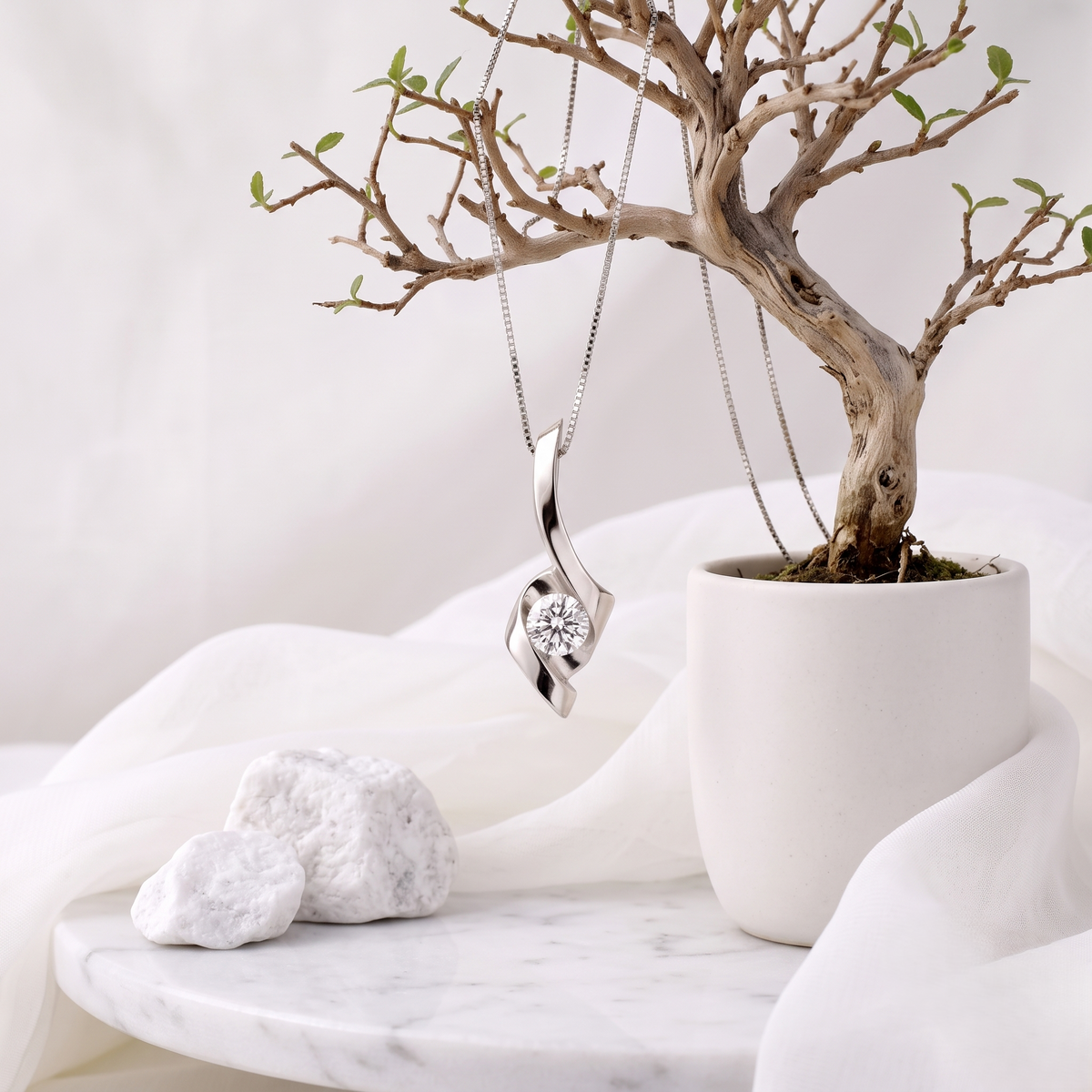 The Silver Swirl Solitaire Pendant