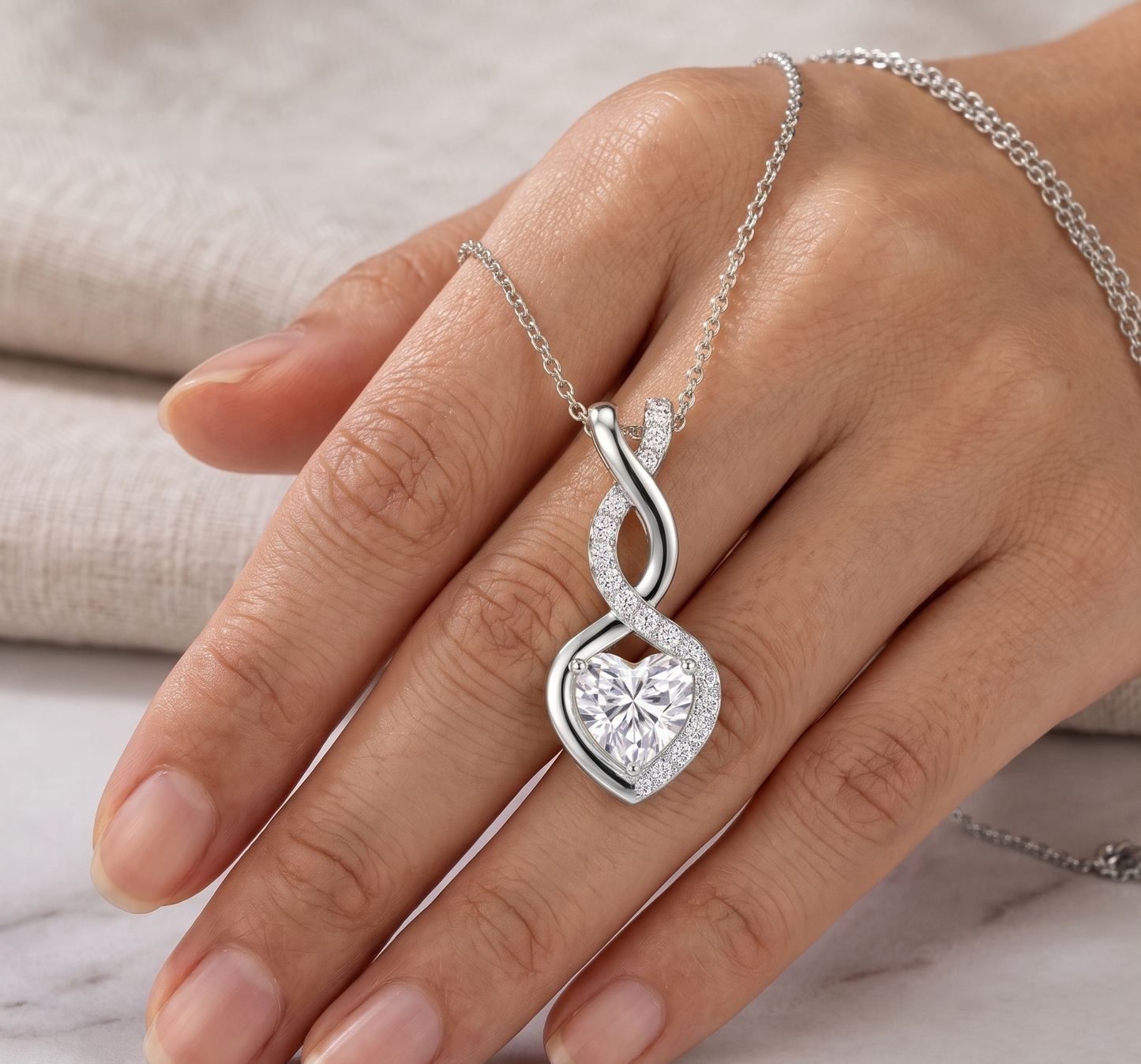 Infinity Twist Heart-Cut Silver Chain Pendant