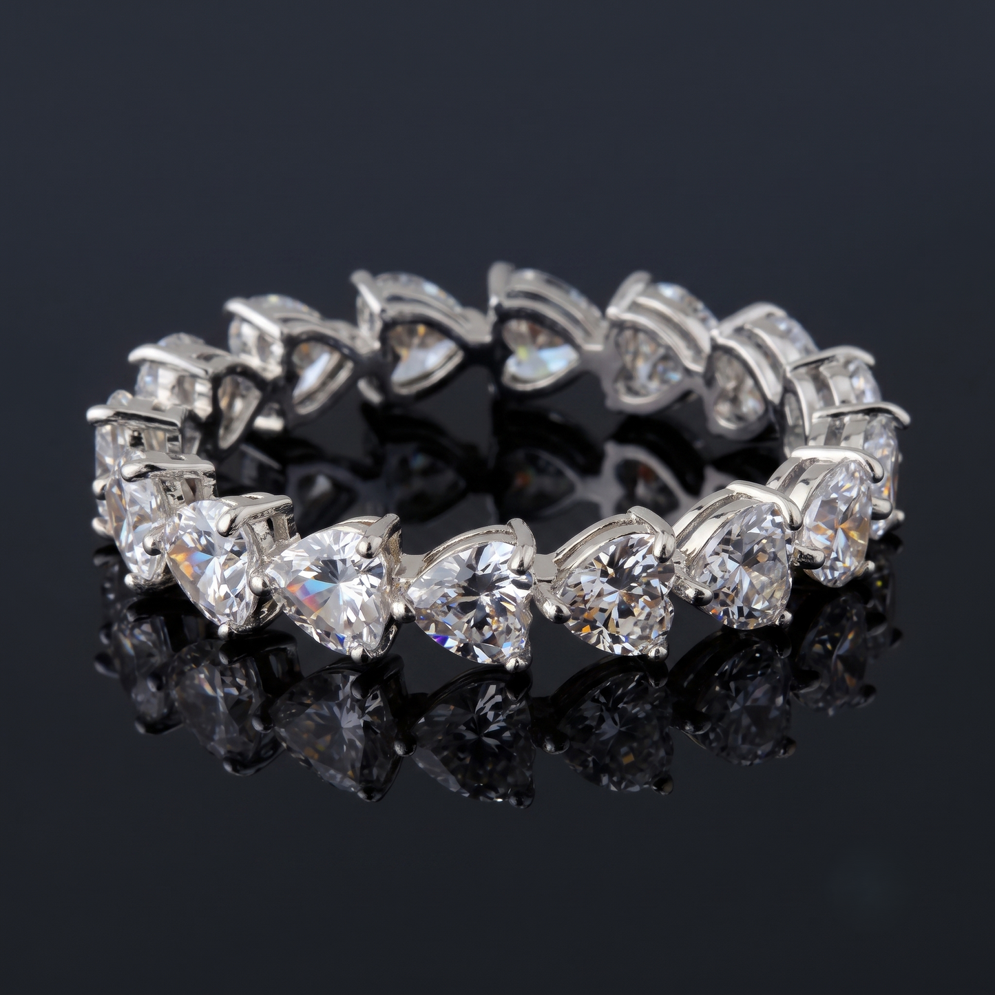 A silver-toned heart-link eternity band