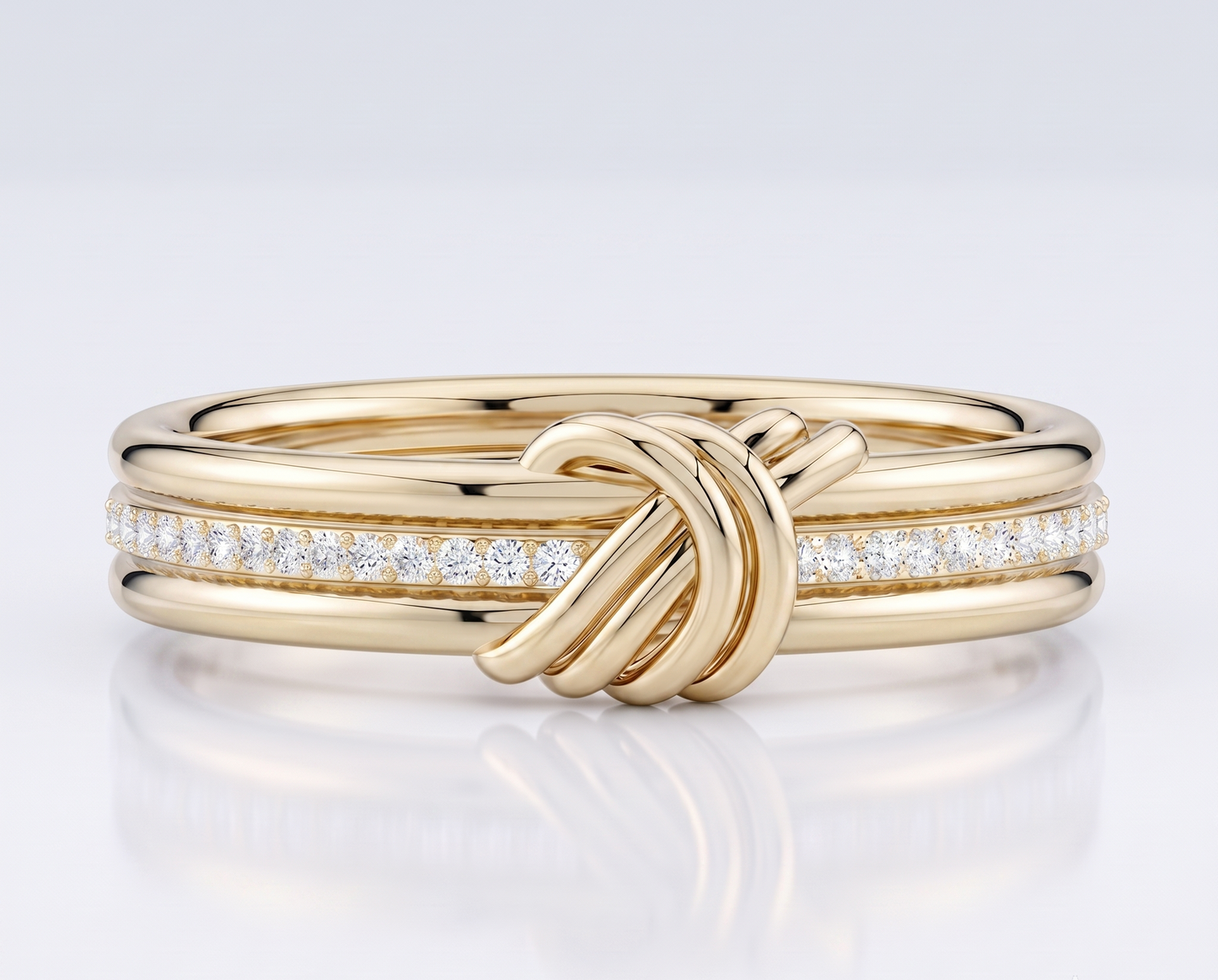 A silver-toned triple-band ring
