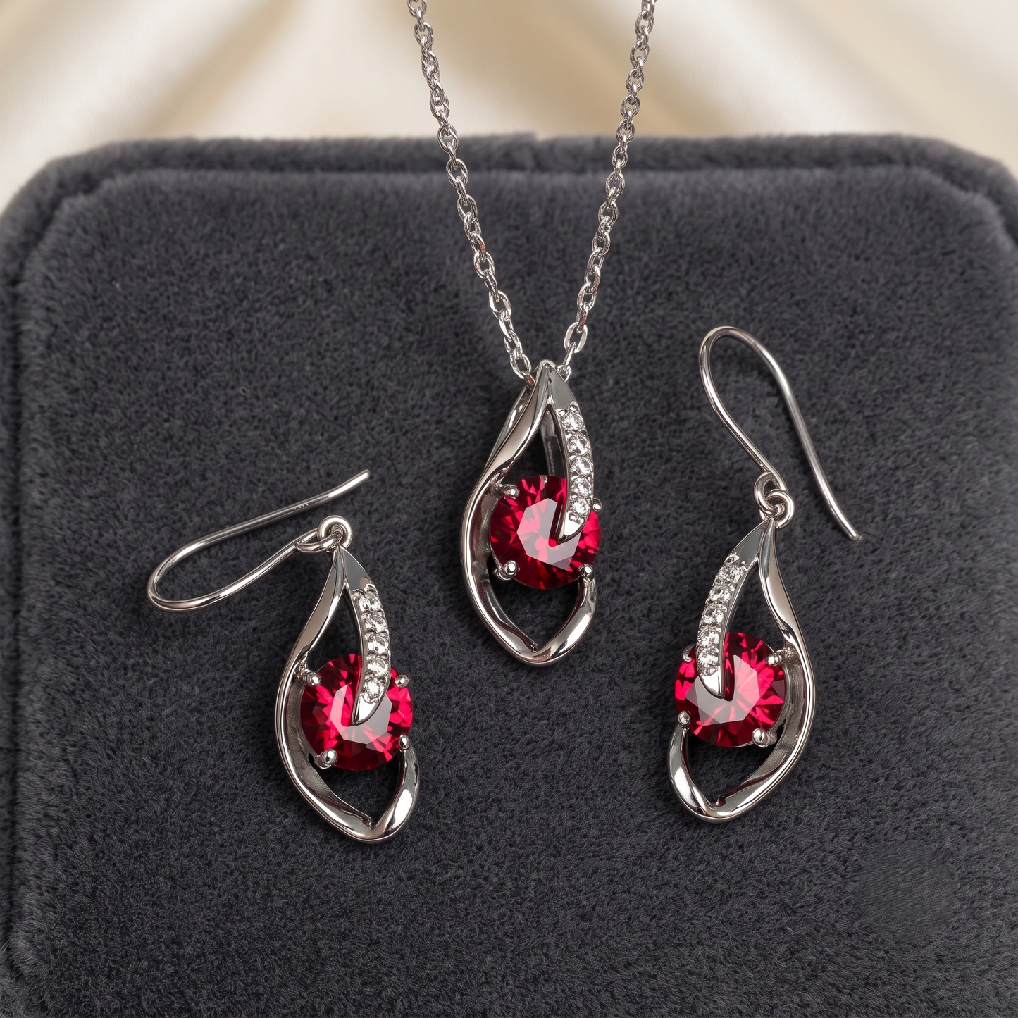 The Crimson Swirl Silver Pendant Set