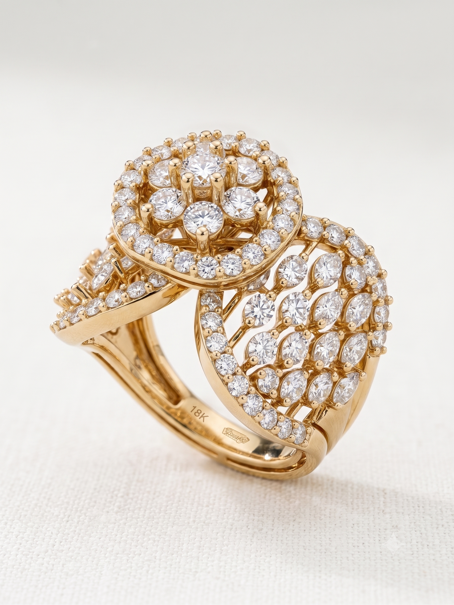 A wide yellow gold plated ring featuring
