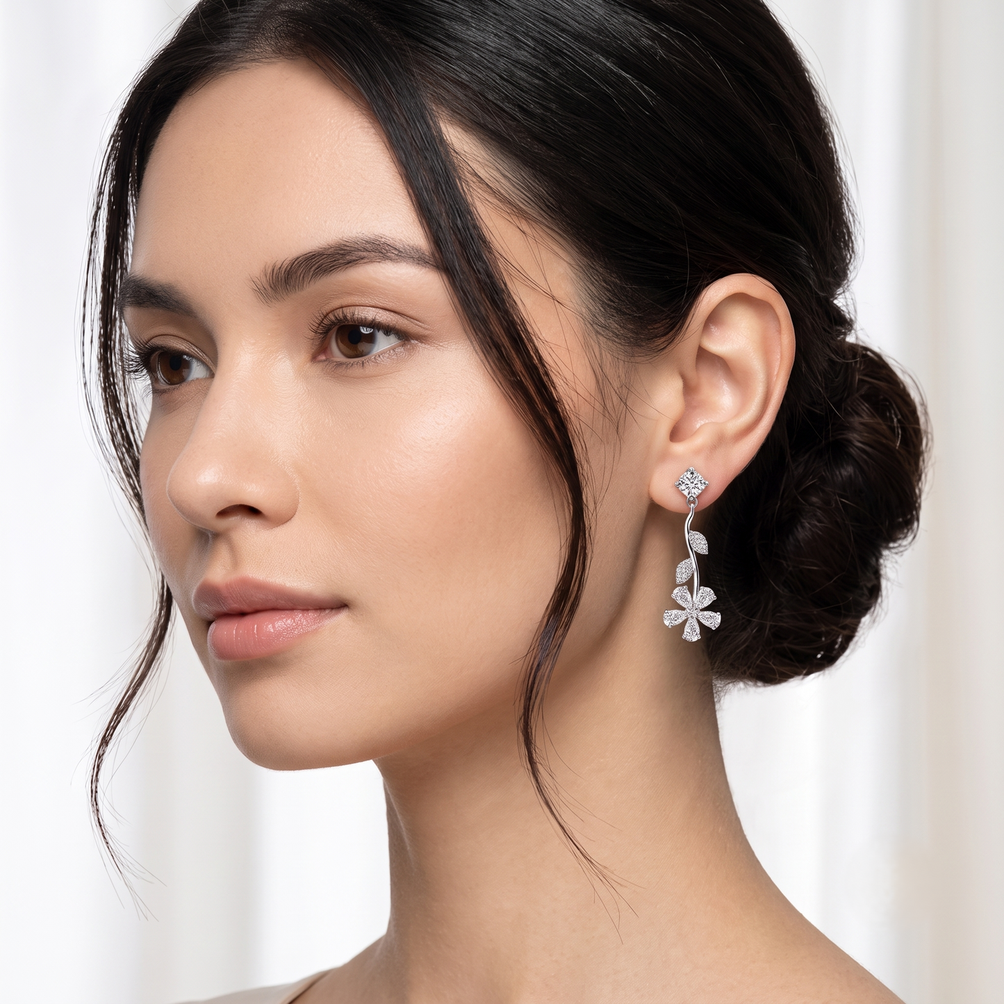 A pair of silver-toned dangle earrings