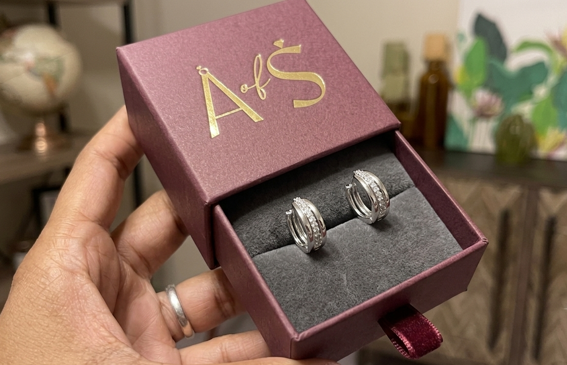A pair of silver-toned hoop earrings