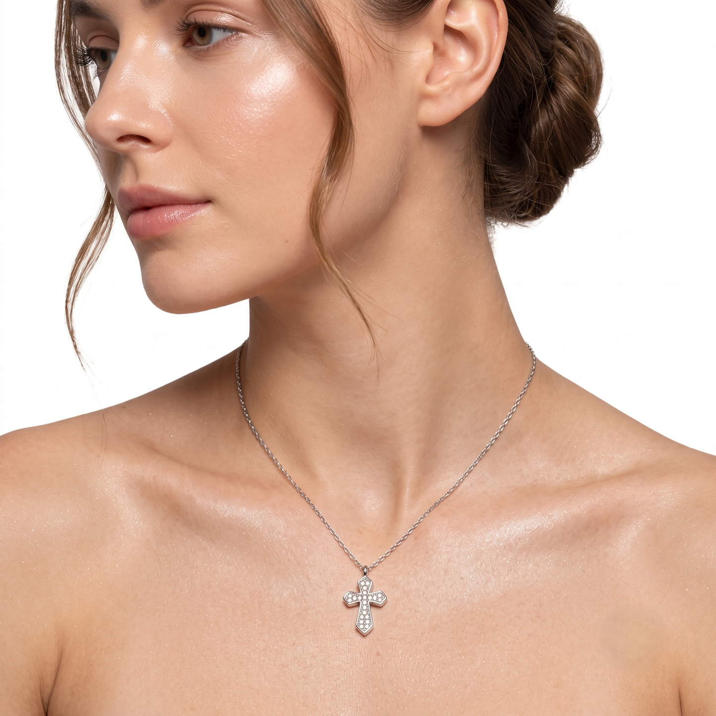A silver cross pendant necklace