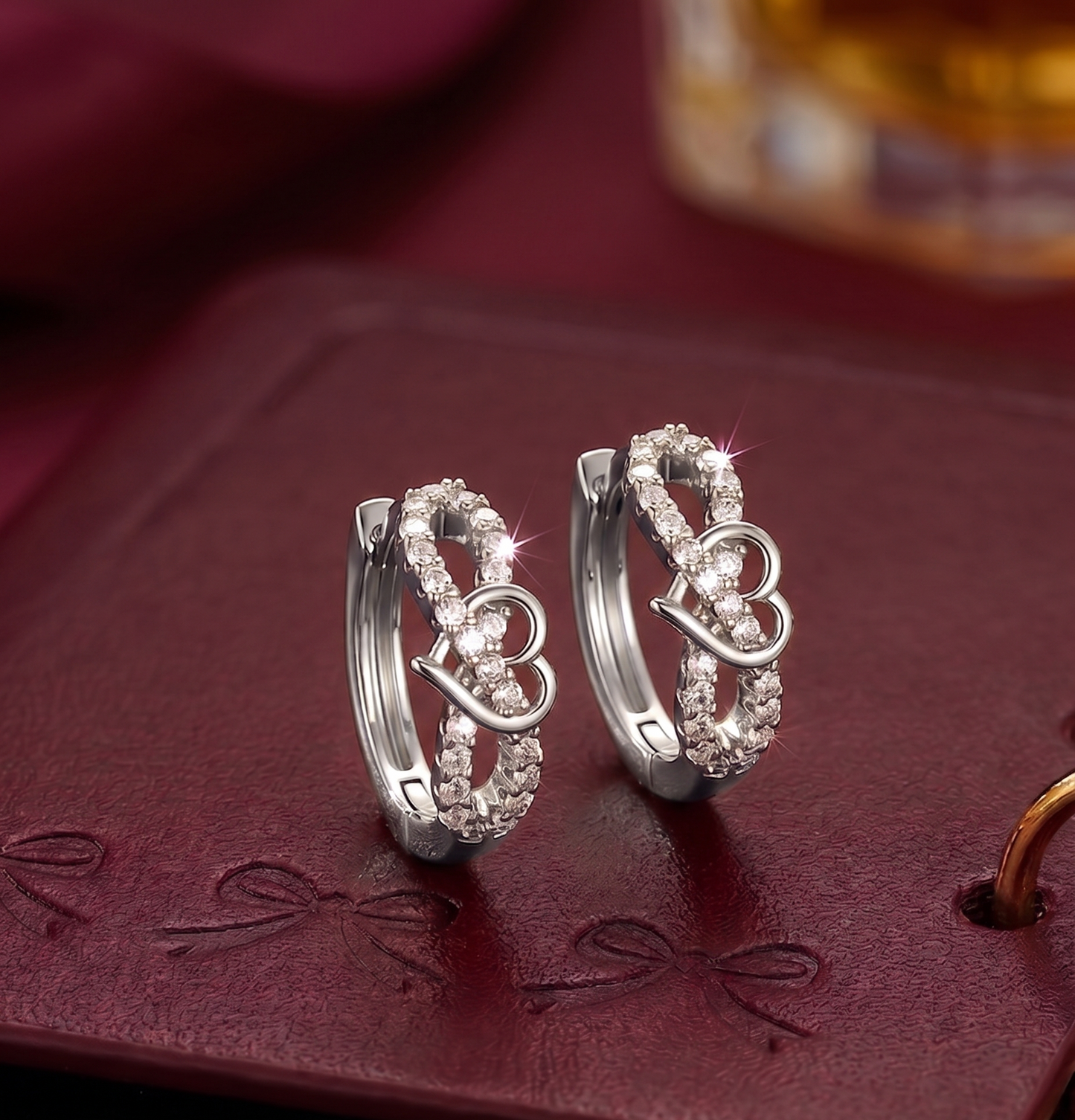 The Heart-Linked Silver Hoops