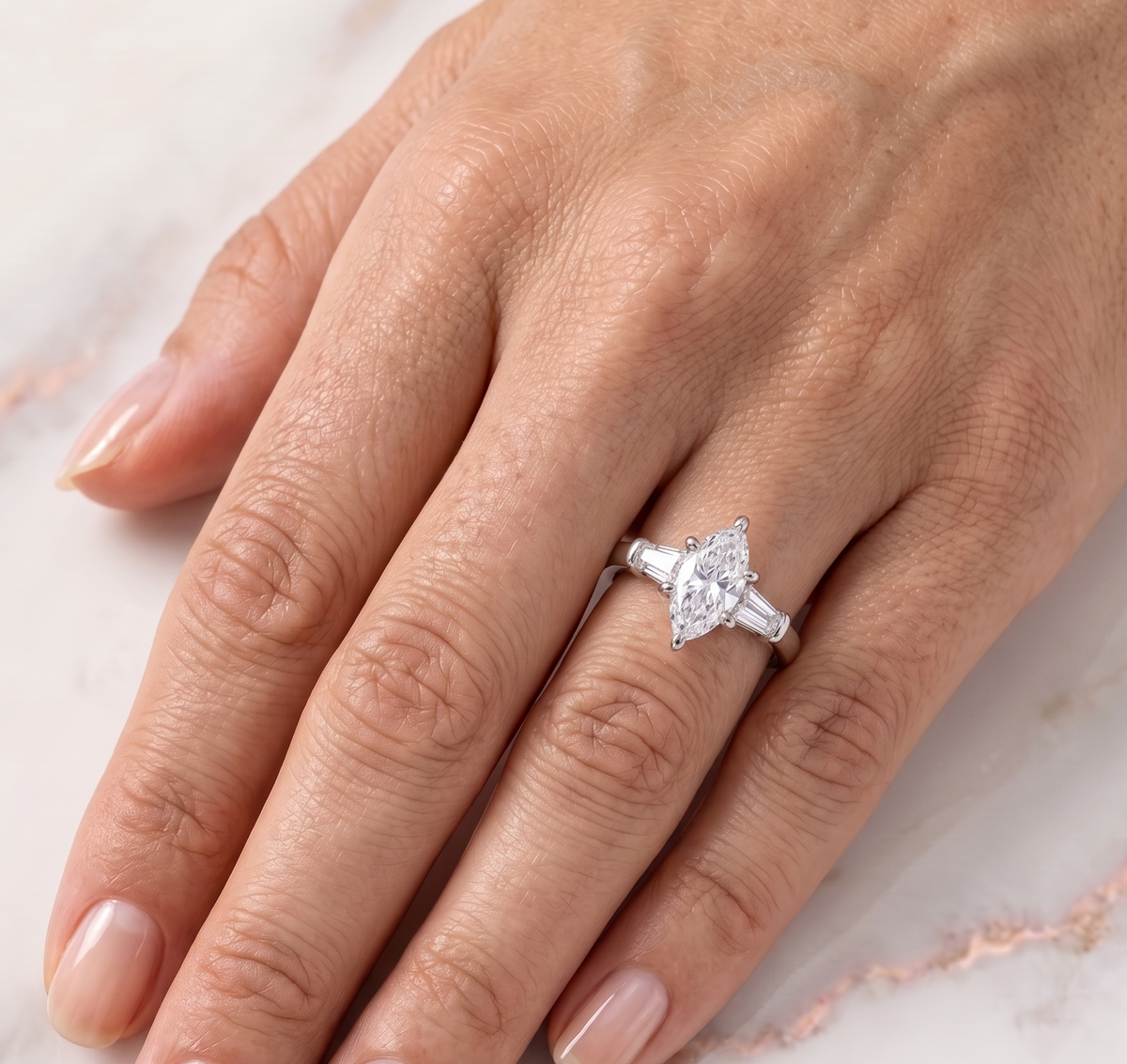 The "Eternal Radiance" Three-Stone Marquise Silver Ring