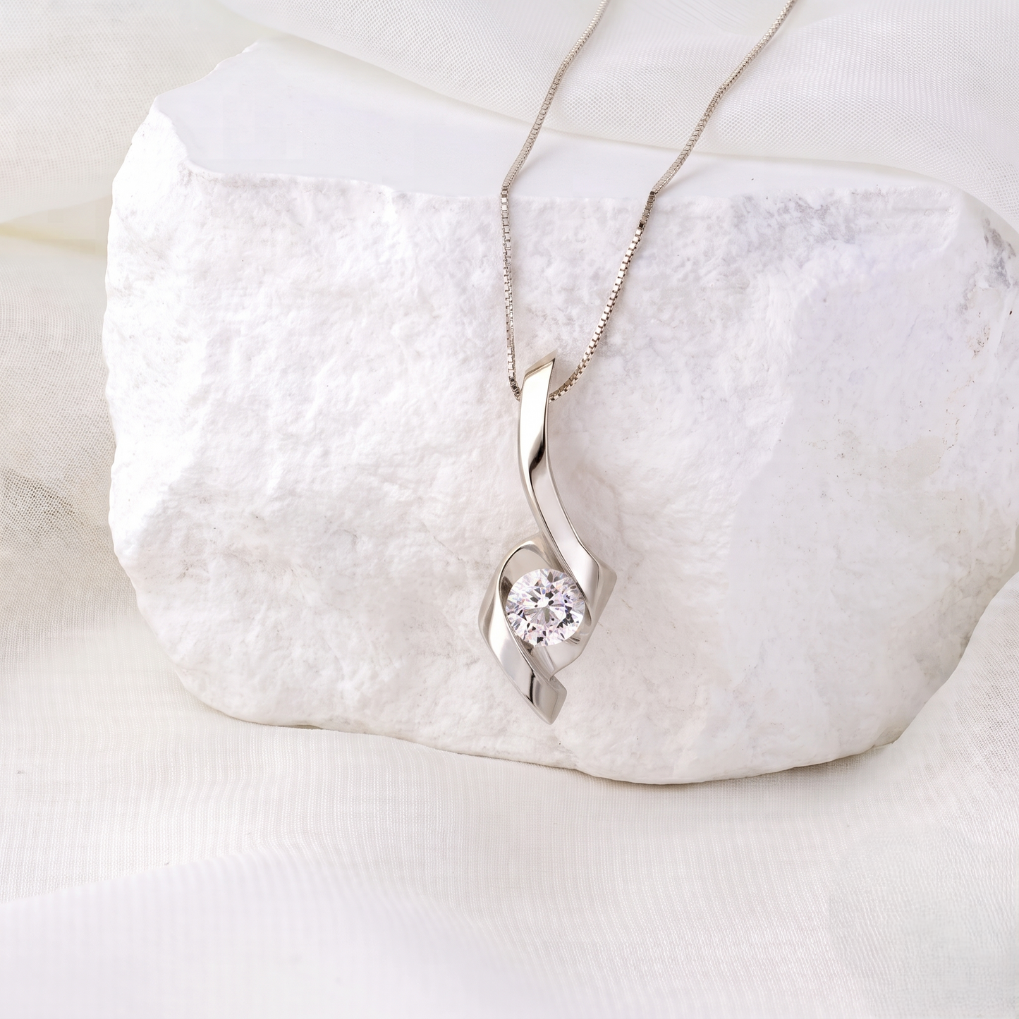 The Silver Swirl Solitaire Pendant