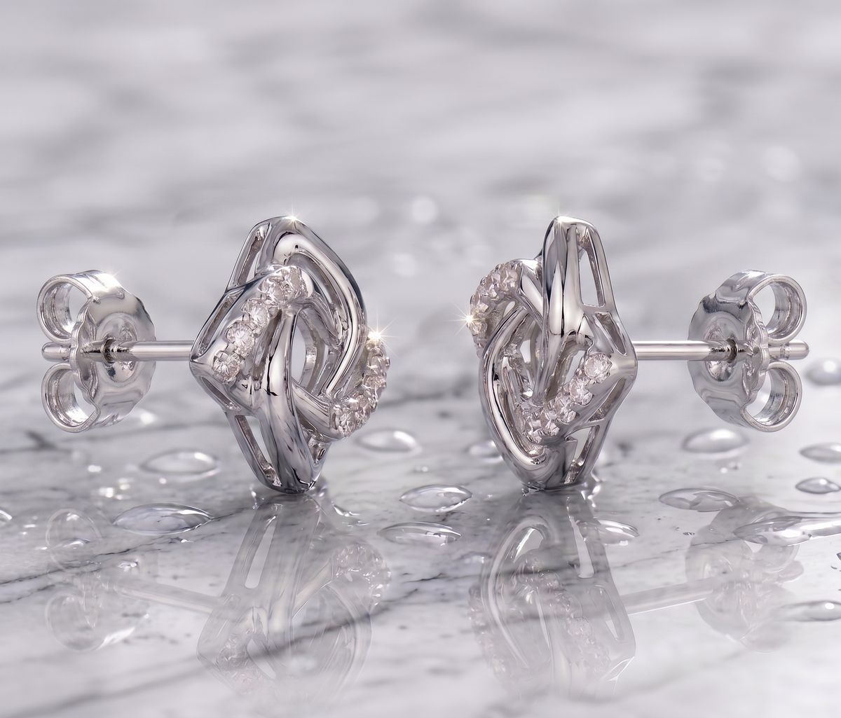 Half-Pavé Geometric Knot Earrings in Silver