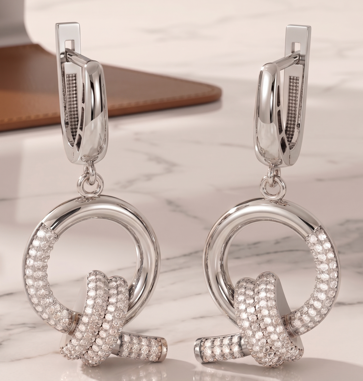 The Lumina Interlocking Ribbon Dangles