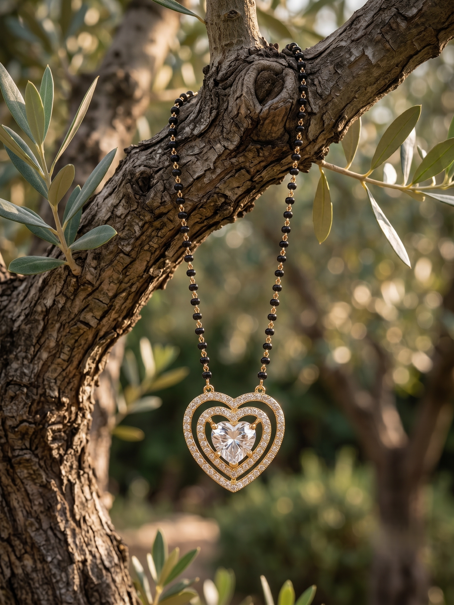 The haert Shape Mangalsutra in 925 Silver Gold Plated