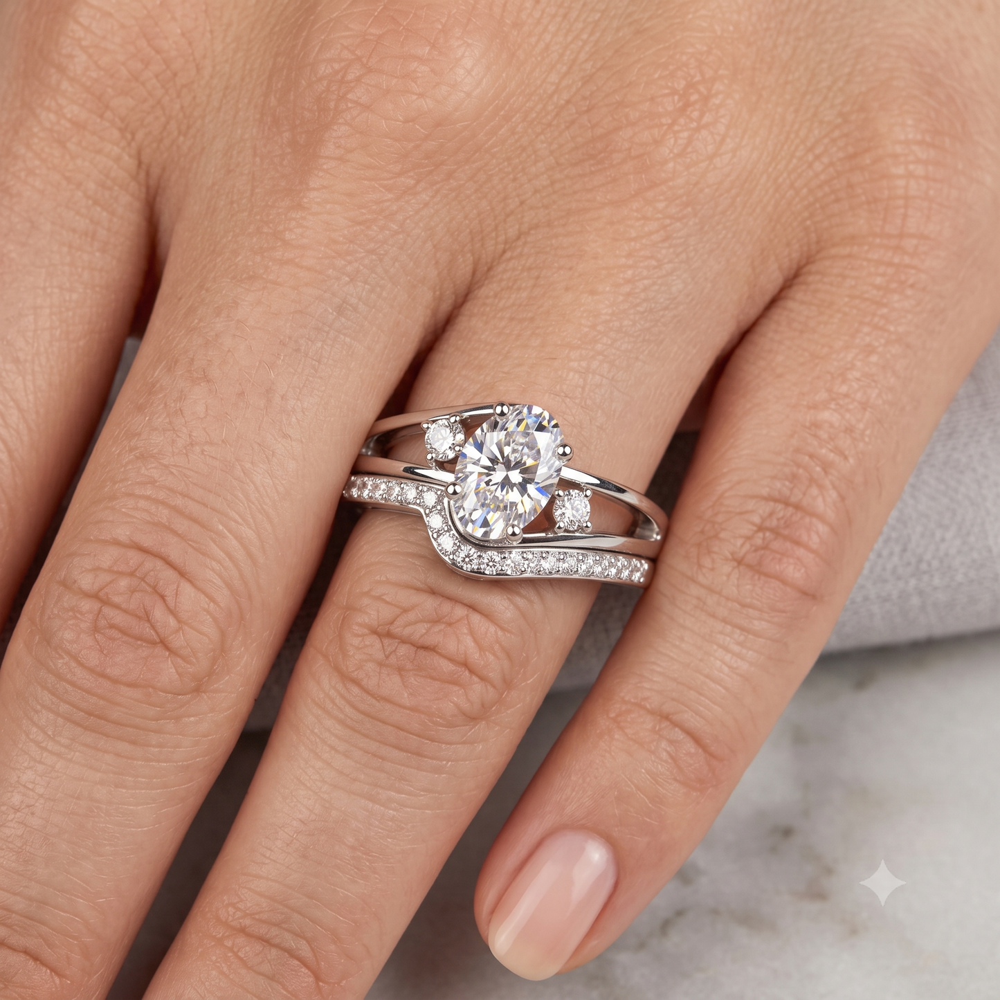 A silver-tone split-shank ring