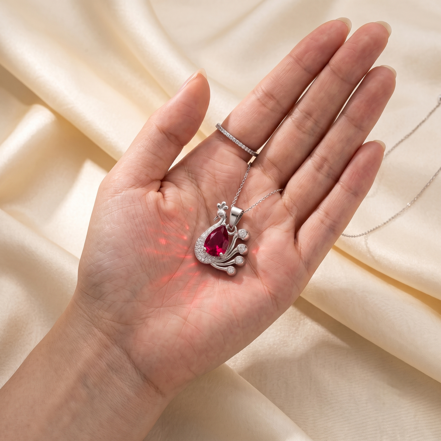 The Ruby Teardrop Peacock Silver Chain Pendant