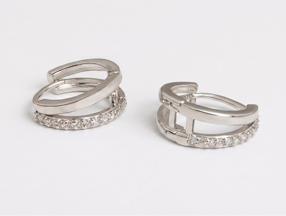 A pair of silver-toned hoop earrings