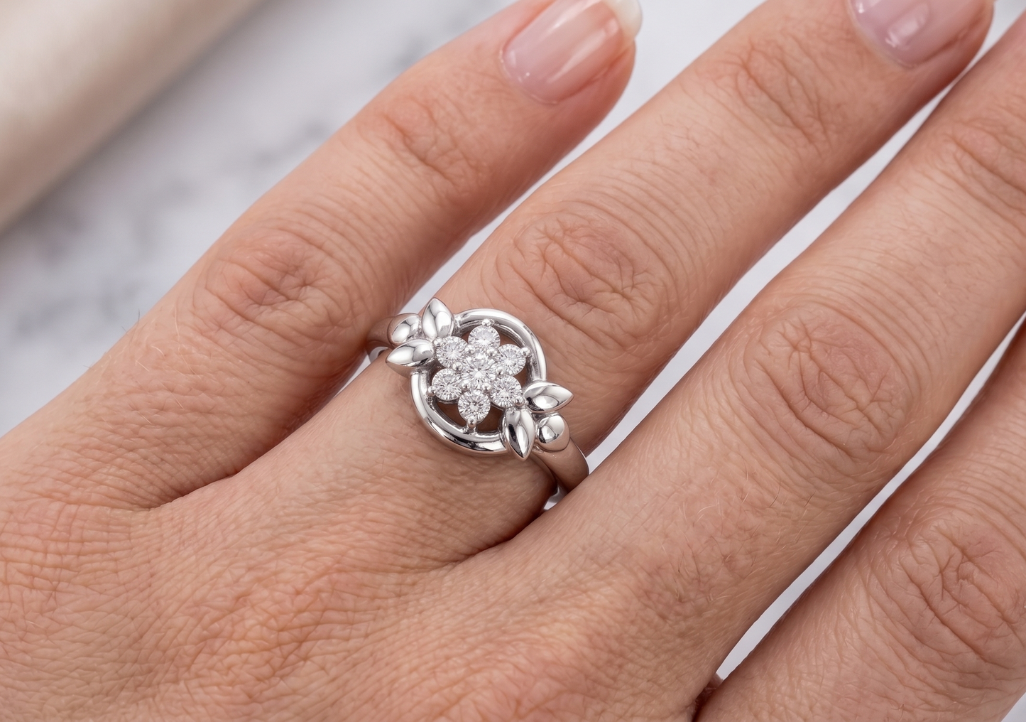 A Silver Diamond Flower Halo Ring