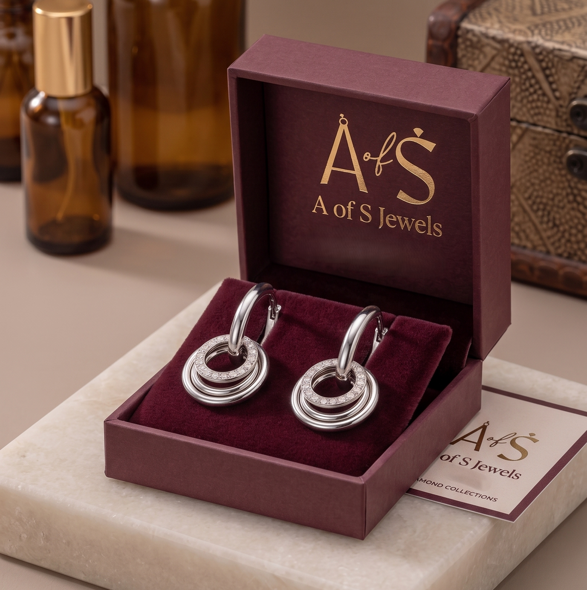 The Infinity Loop Silver Hoop Earrings