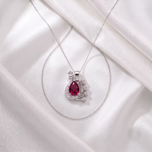 The Ruby Teardrop Peacock Silver Chain Pendant