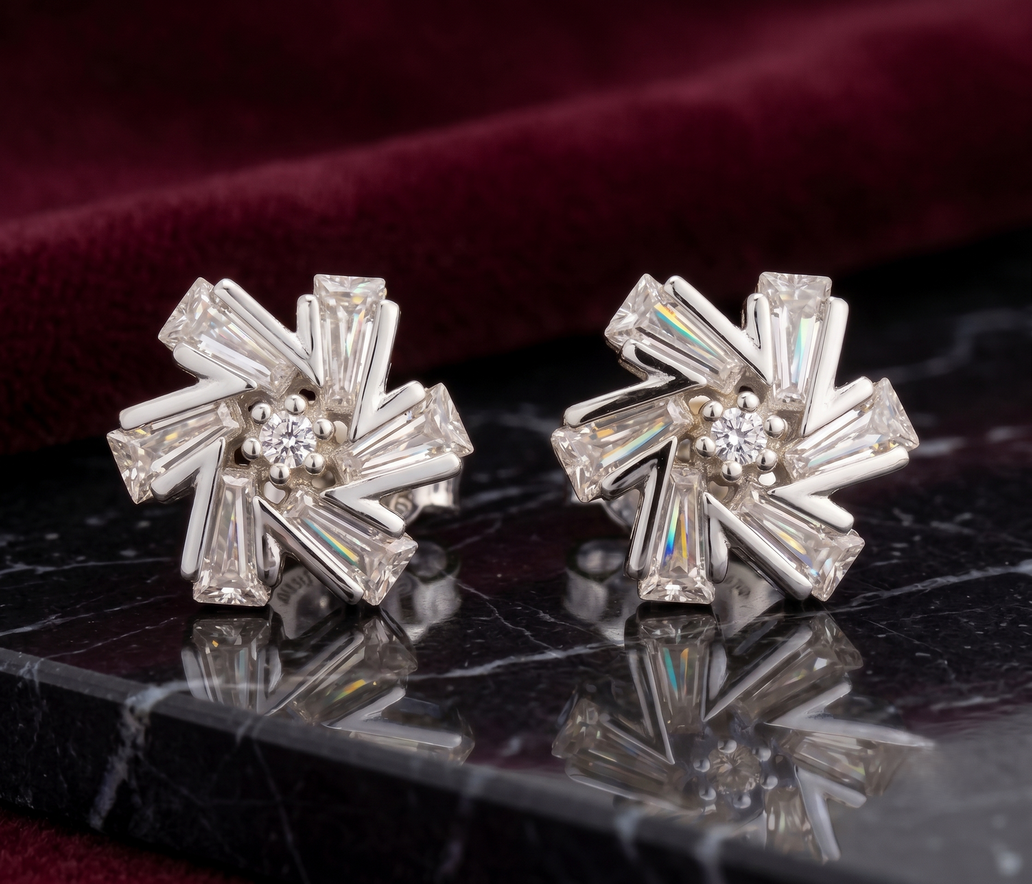 A pair of silver-tone geometric stud earrings