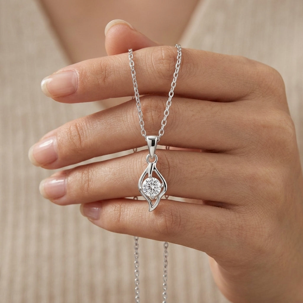 A Sterling Silver Swirl Solitaire Pendant