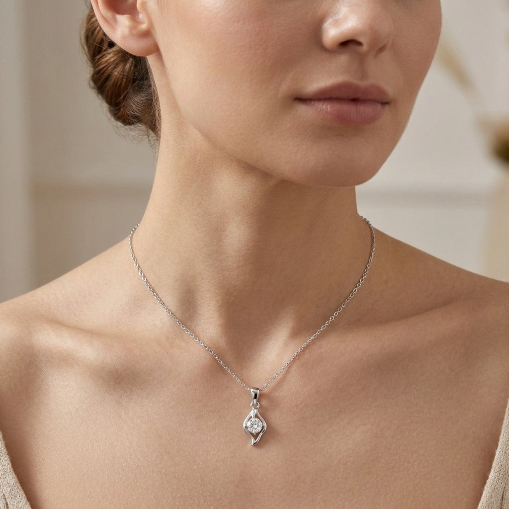 A Sterling Silver Swirl Solitaire Pendant