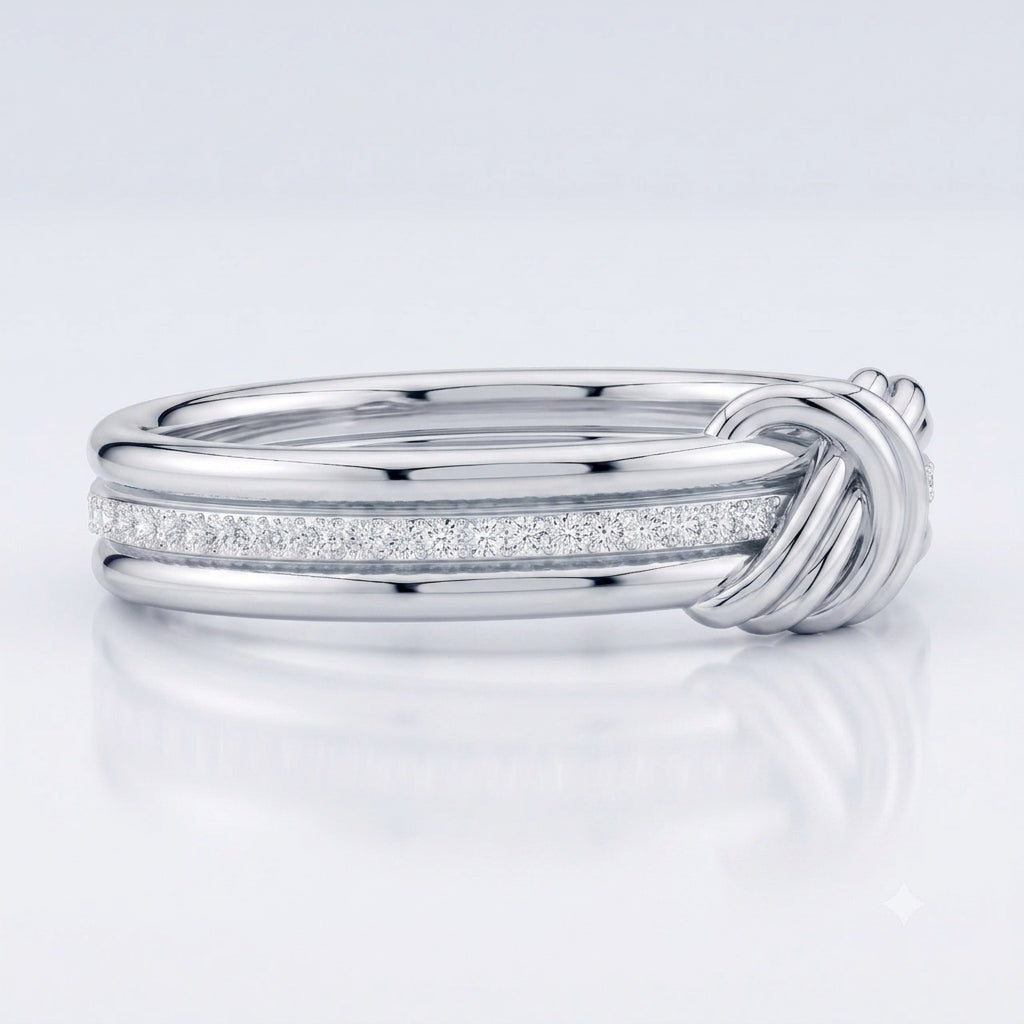 A silver-toned triple-band ring