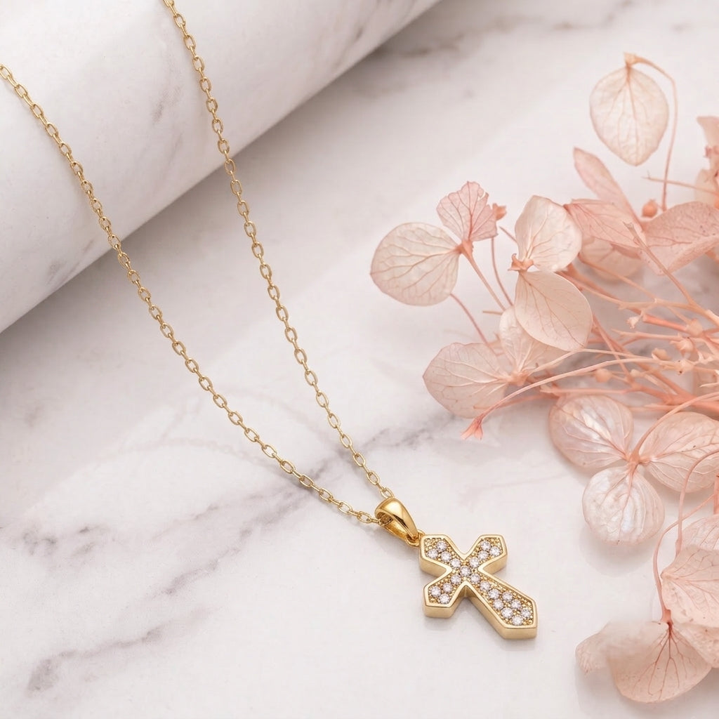 A silver cross pendant necklace