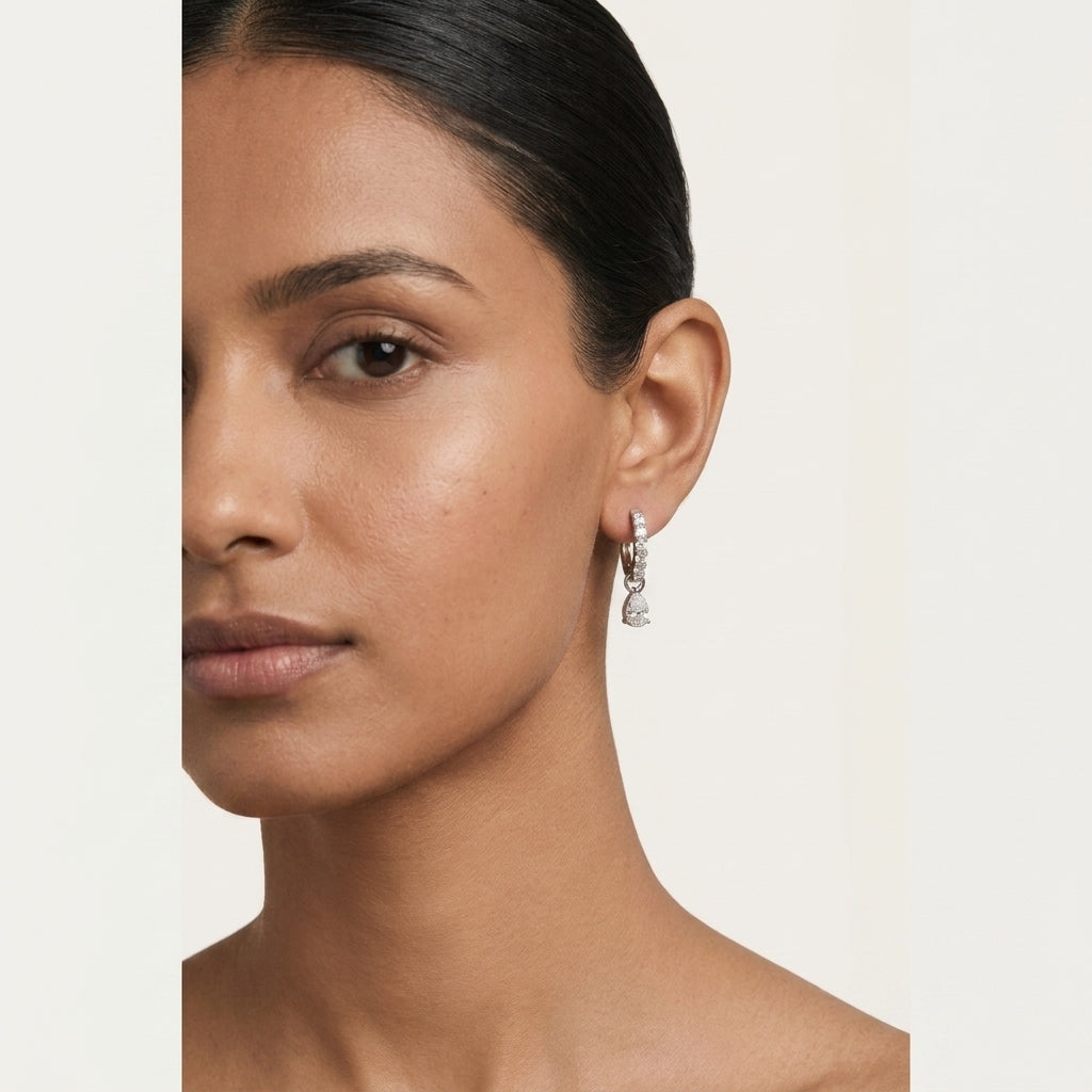 A pair of silver-toned drop earrings