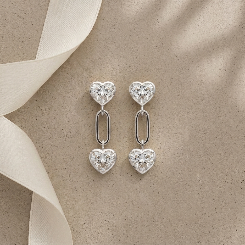 The "Tethered Hearts" Silver Drop Earrings